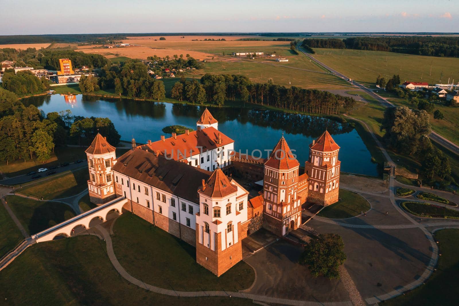 Mir castle with spires near the lake top view in Belarus near the city of Mir.