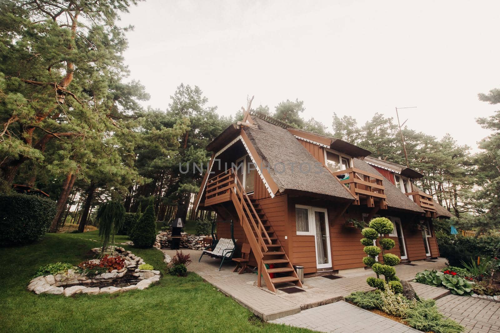 Nida Lithuania Beautiful old Lithuanian traditional wooden house in Nida, Lithuania, Europe by Lobachad