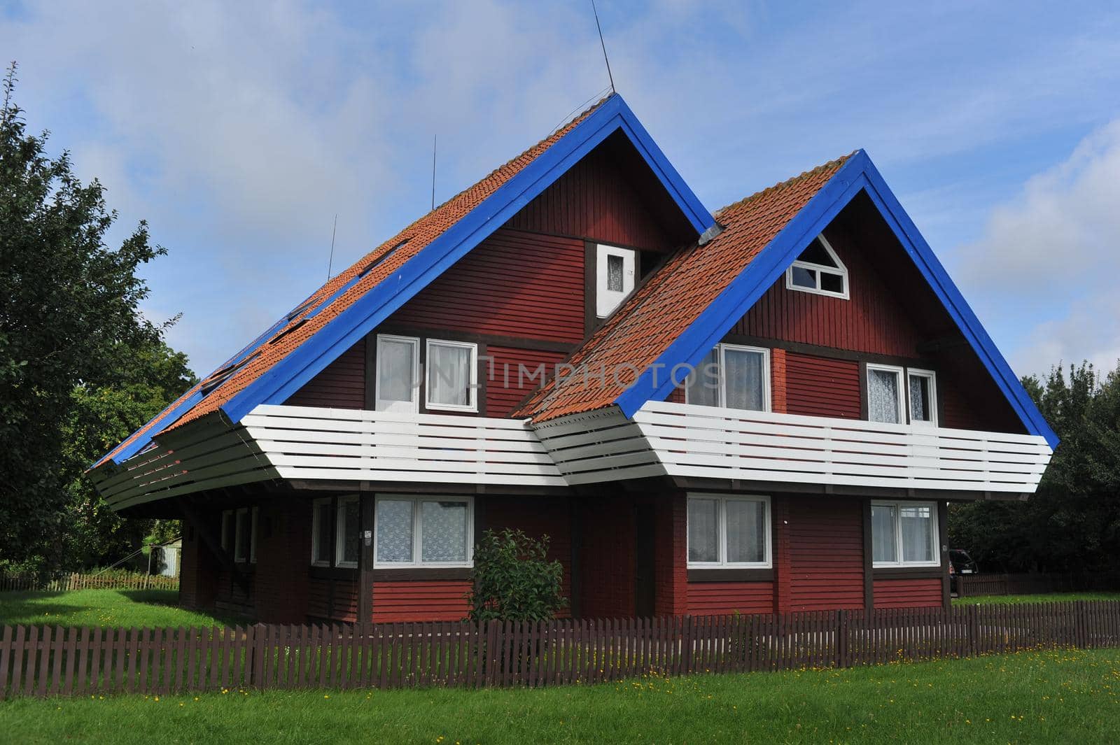 Nida Lithuania Beautiful old Lithuanian traditional wooden house in Nida, Lithuania, Europe by Lobachad