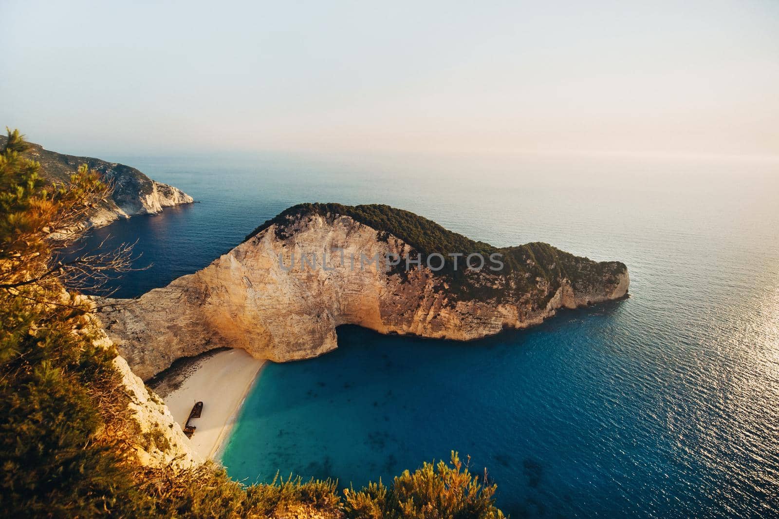 Navagio Bay Shipwreck Beach without people, top down view, Greece, Zakynthos. by Lobachad