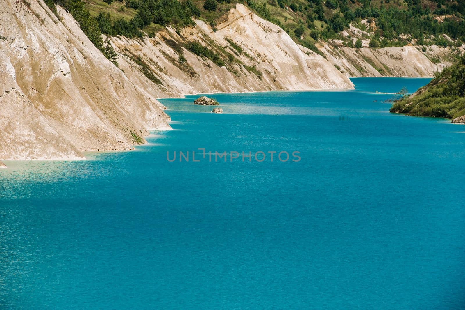 Volkovysk chalk pits or Belarusian Maldives beautiful saturated blue lakes. Famous chalk quarries near Vaukavysk, Belarus. Developed for the needs of Krasnaselski plant construction materials.