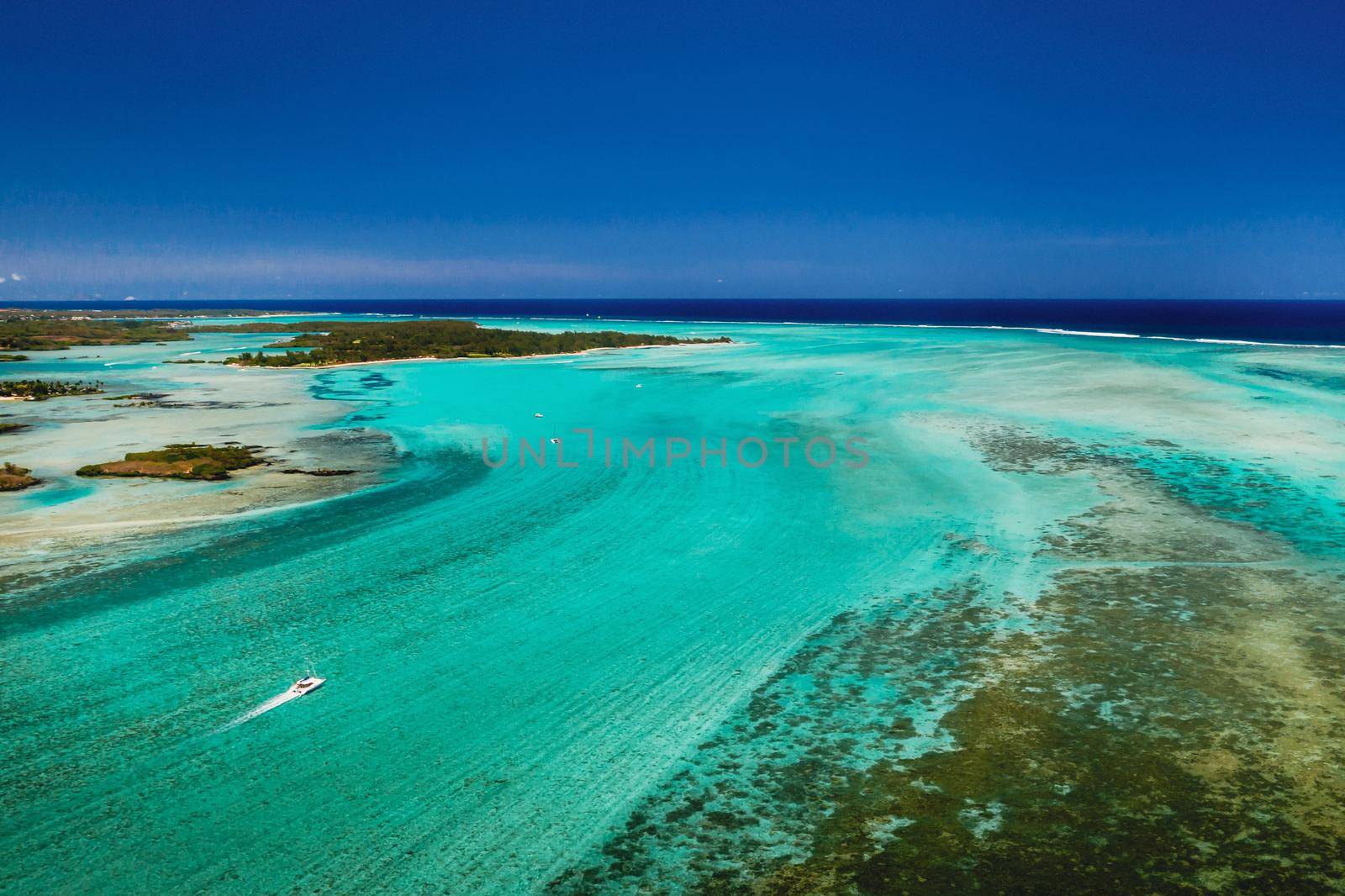 The view from the bird's eye view on the coast of Mauritius. Amazing landscapes of Mauritius.Beautiful coral reef of the island by Lobachad