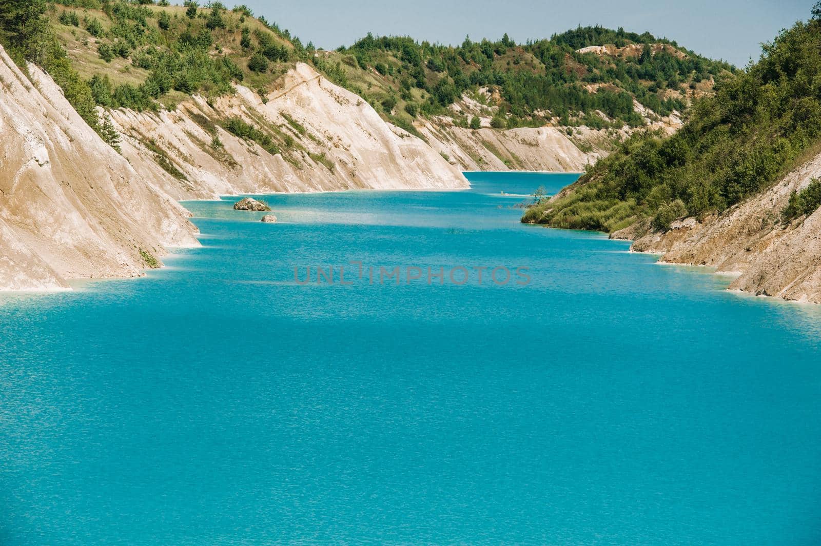 Volkovysk chalk pits or Belarusian Maldives beautiful saturated blue lakes. Famous chalk quarries near Vaukavysk, Belarus. Developed for the needs of Krasnaselski plant construction materials. by Lobachad