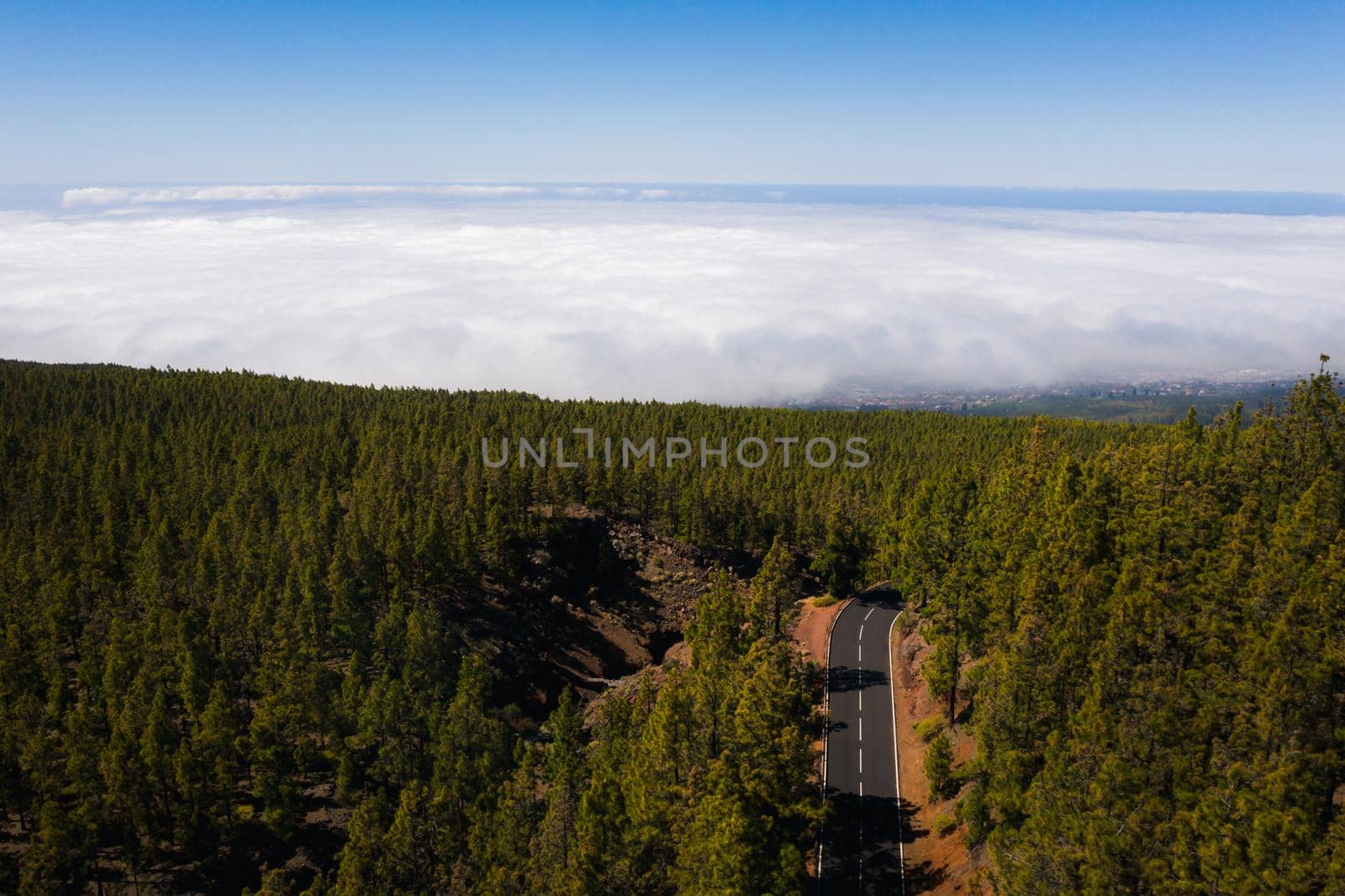 Cloud sea under mount Teide in Tenerife, aerial View over clouds on the island of Tenerife. Canary Islands, Spain by Lobachad