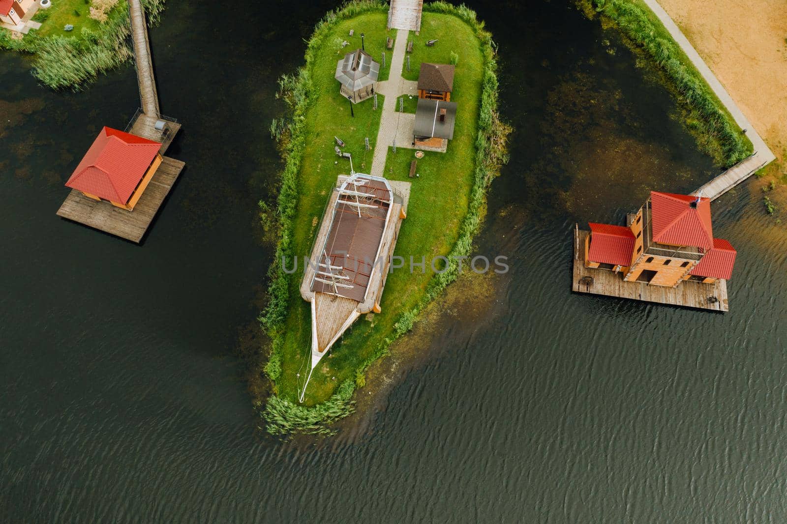 view from the height of the Lake in a green field in the form of a horseshoe and a village in the Mogilev region.Belarus.The Nature Of Belarus.