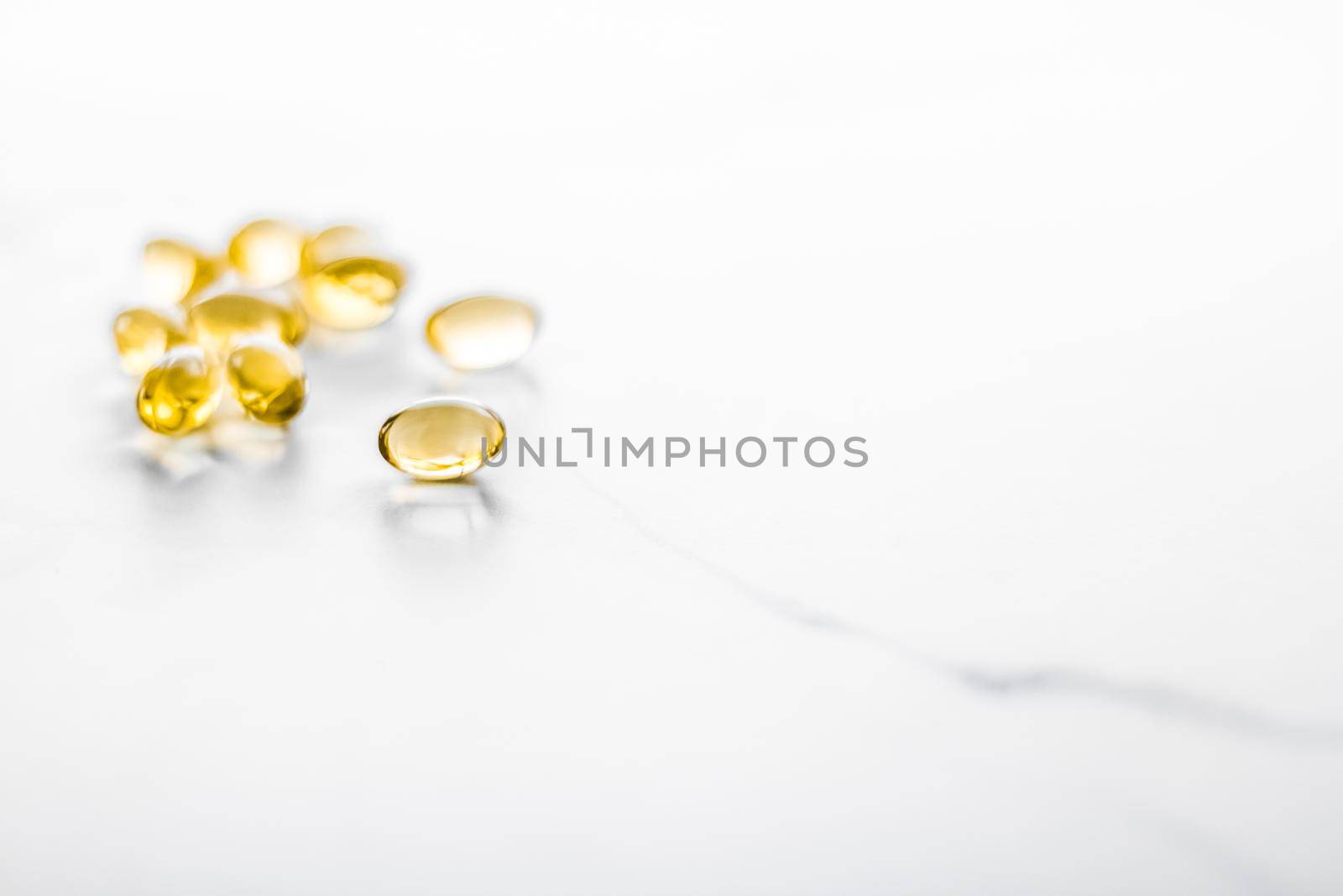 Pharmaceutical, branding and science concept - Vitamin D and golden Omega 3 pills for healthy diet nutrition, fish oil food supplement pill capsules, healthcare and medicine as pharmacy background