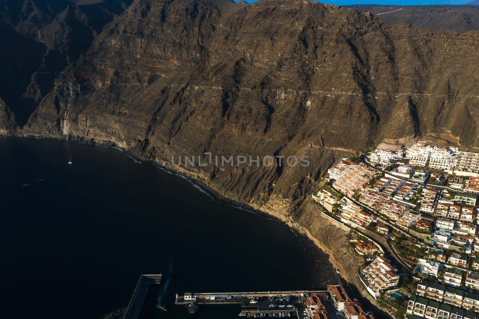 Aerial panorama of Acantilados de Los Gigantes Cliffs of the Giants at sunset, Tenerife, Canary islands, Spain