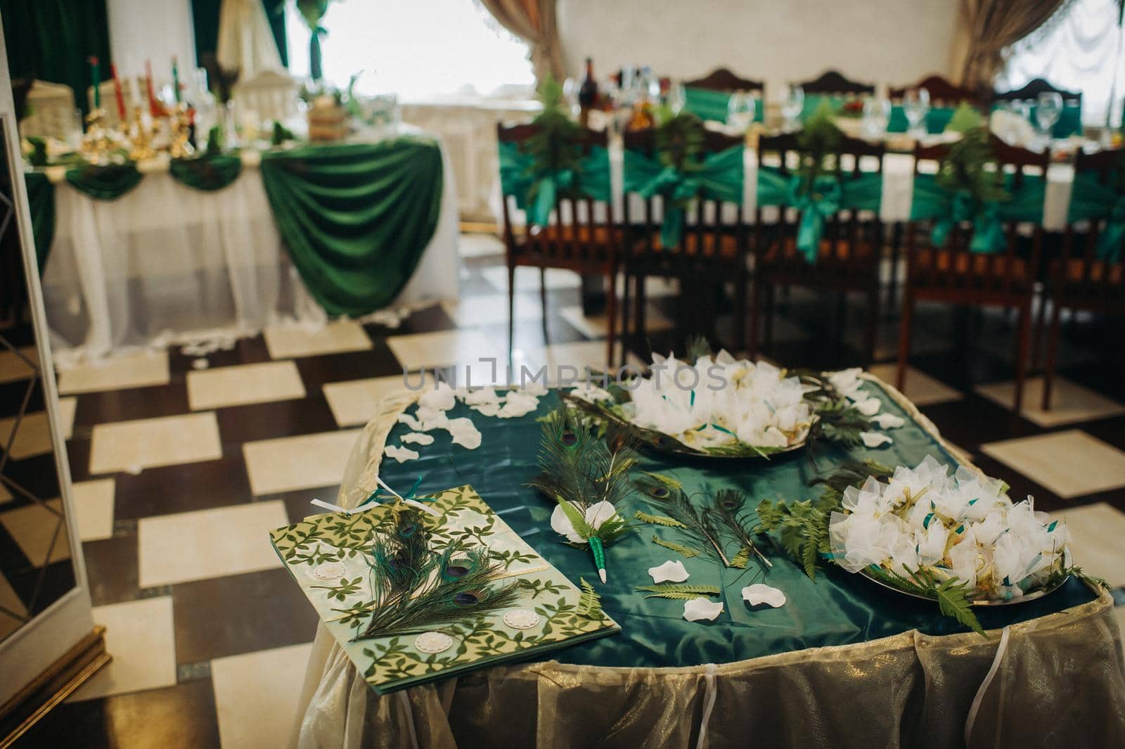 wedding table decoration with flowers on the table in green style, dinner table decor.