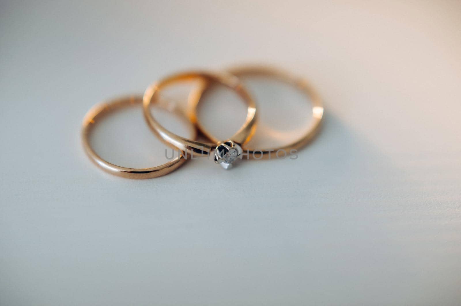 Close-up of two gold wedding rings for a wedding.