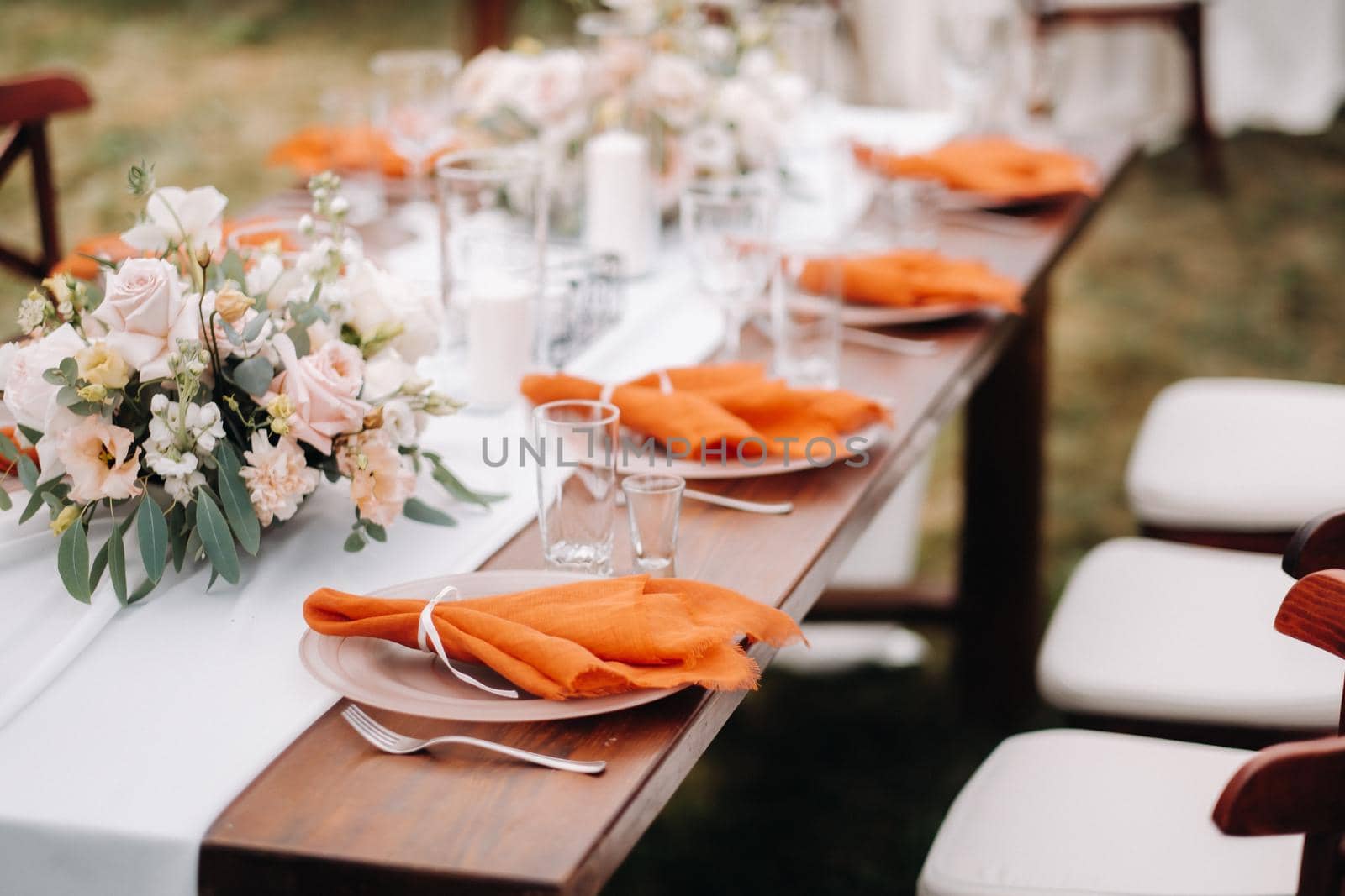 wedding table decoration with flowers on the table, dinner table decor.