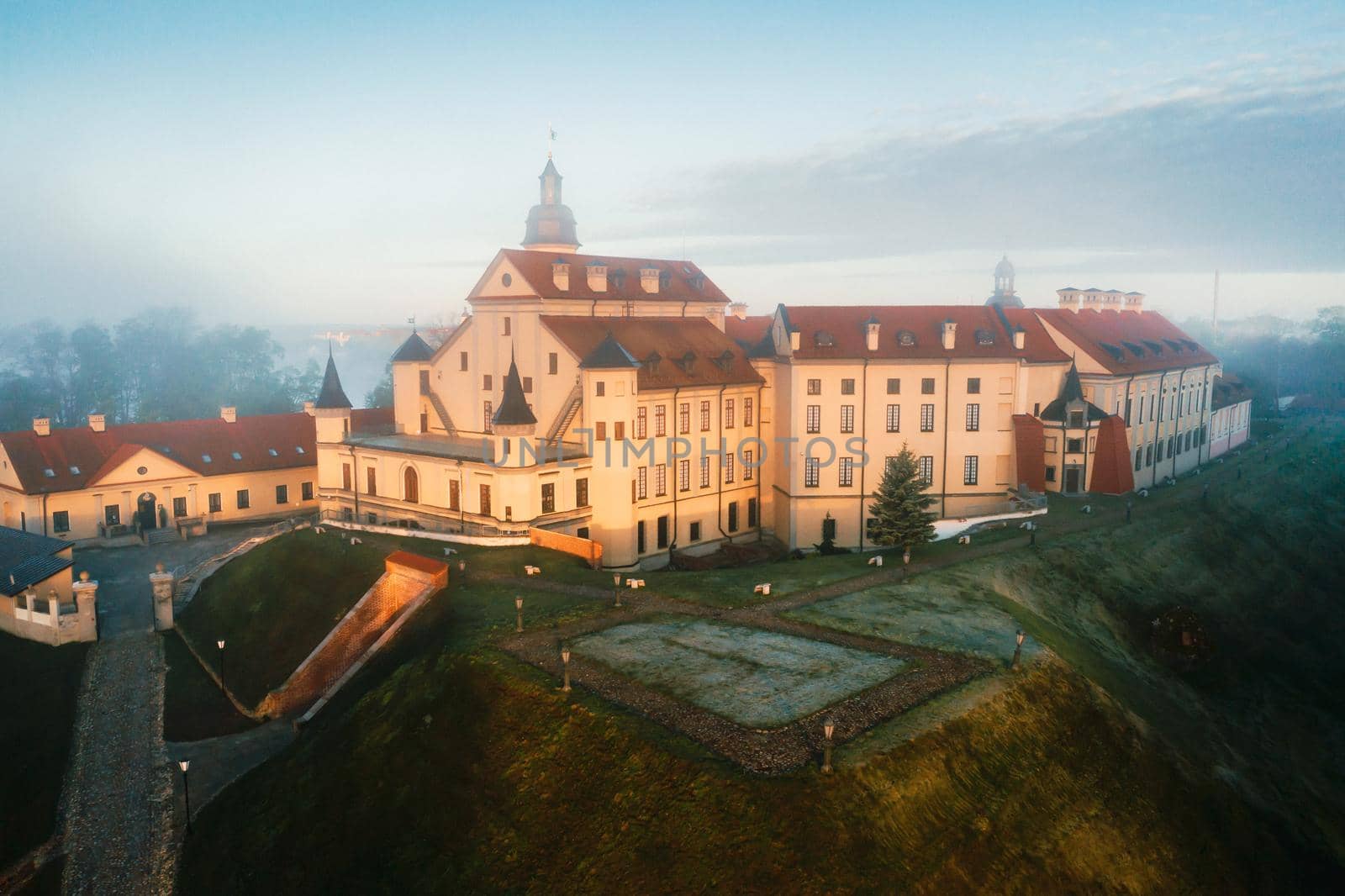 Nesvizh castle is a residential castle of the Radziwill family in Nesvizh, Belarus, with a beautiful view from above at dawn.