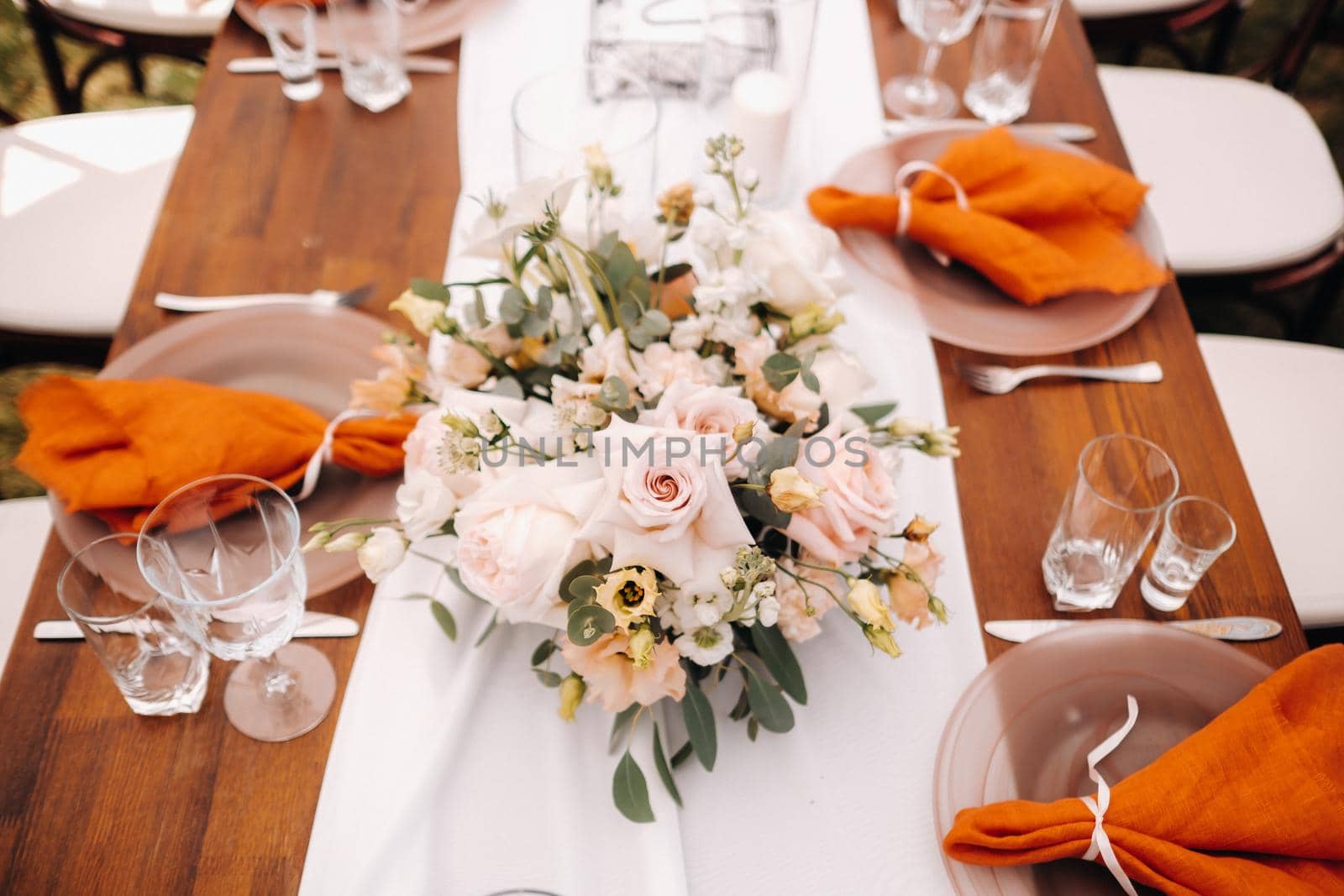 wedding table decoration with flowers on the table, dinner table decor.