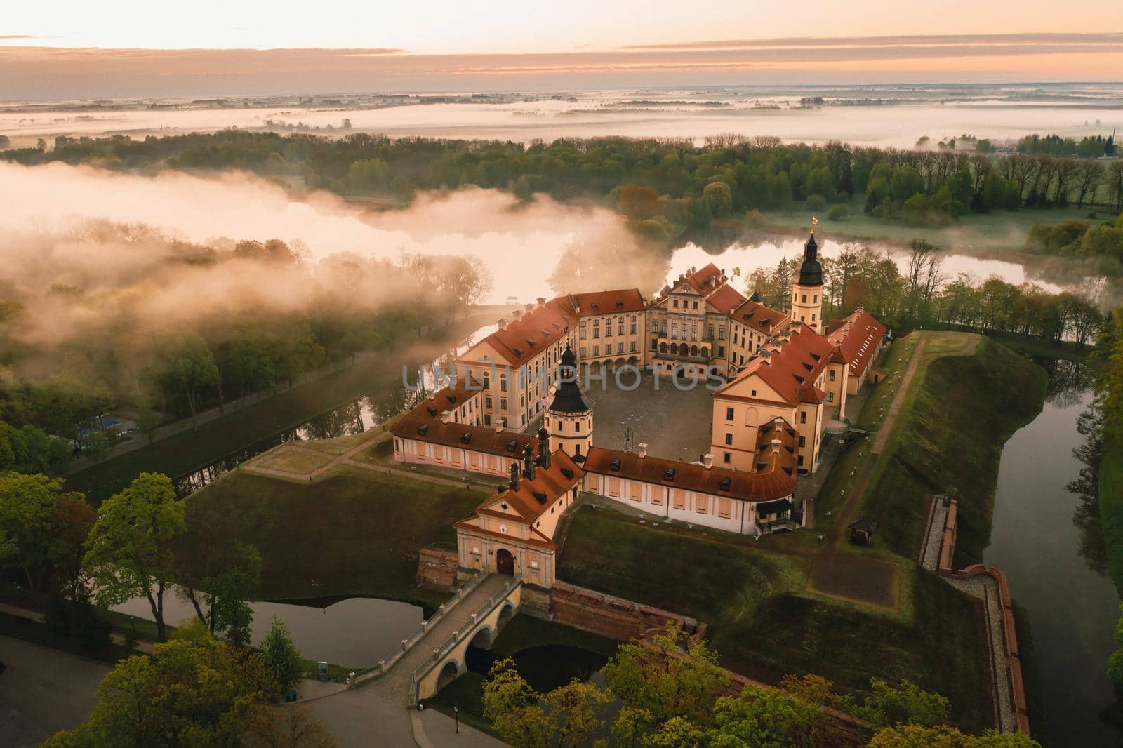 Nesvizh castle is a residential castle of the Radziwill family in Nesvizh, Belarus, with a beautiful view from above at dawn.