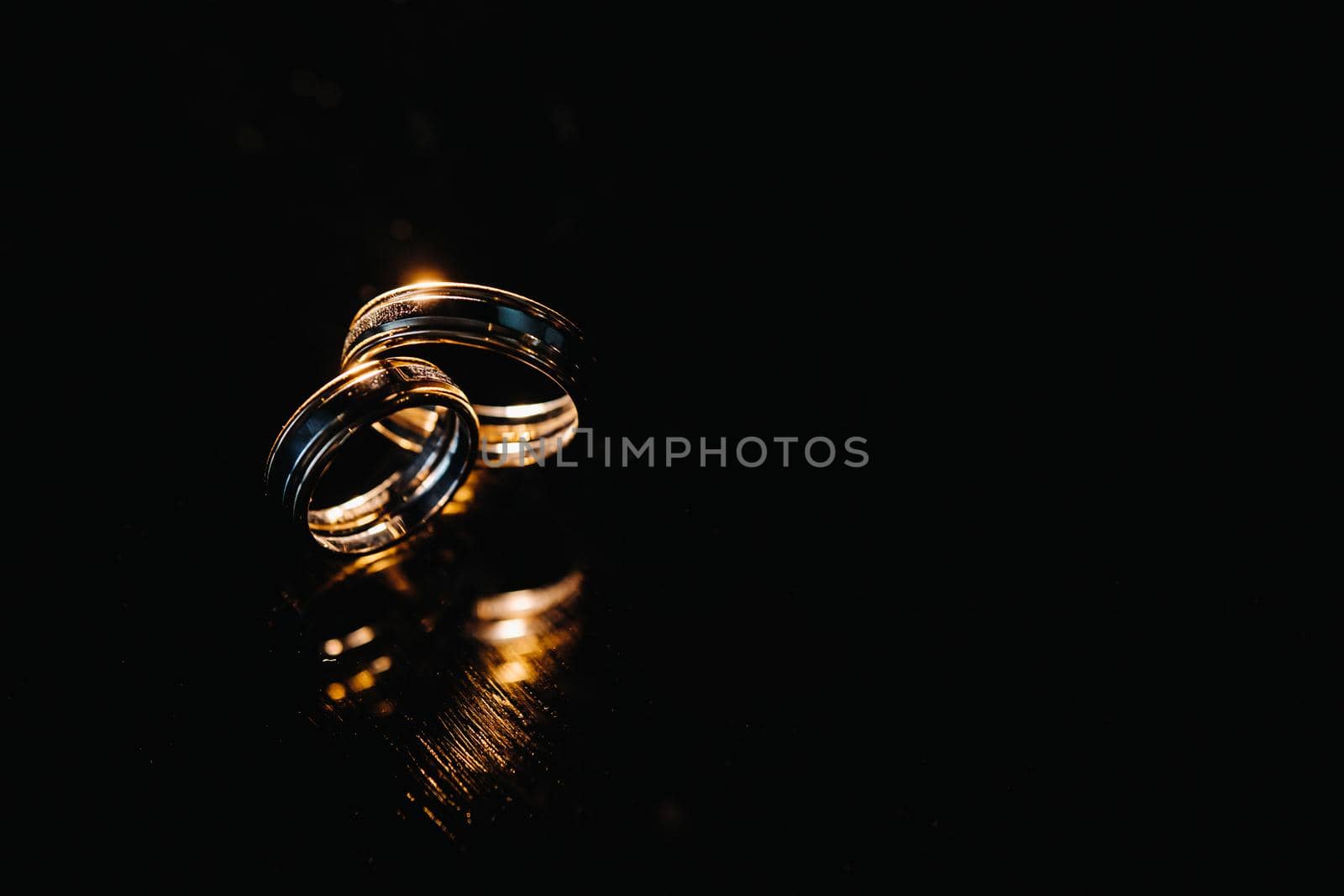 Close-up of two gold wedding rings for a wedding.