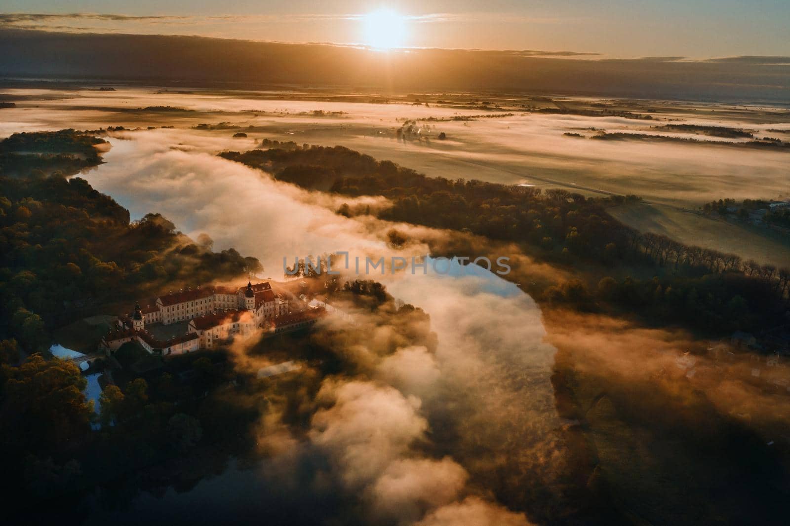 Nesvizh castle is a residential castle of the Radziwill family in Nesvizh, Belarus, with a beautiful view from above at dawn.