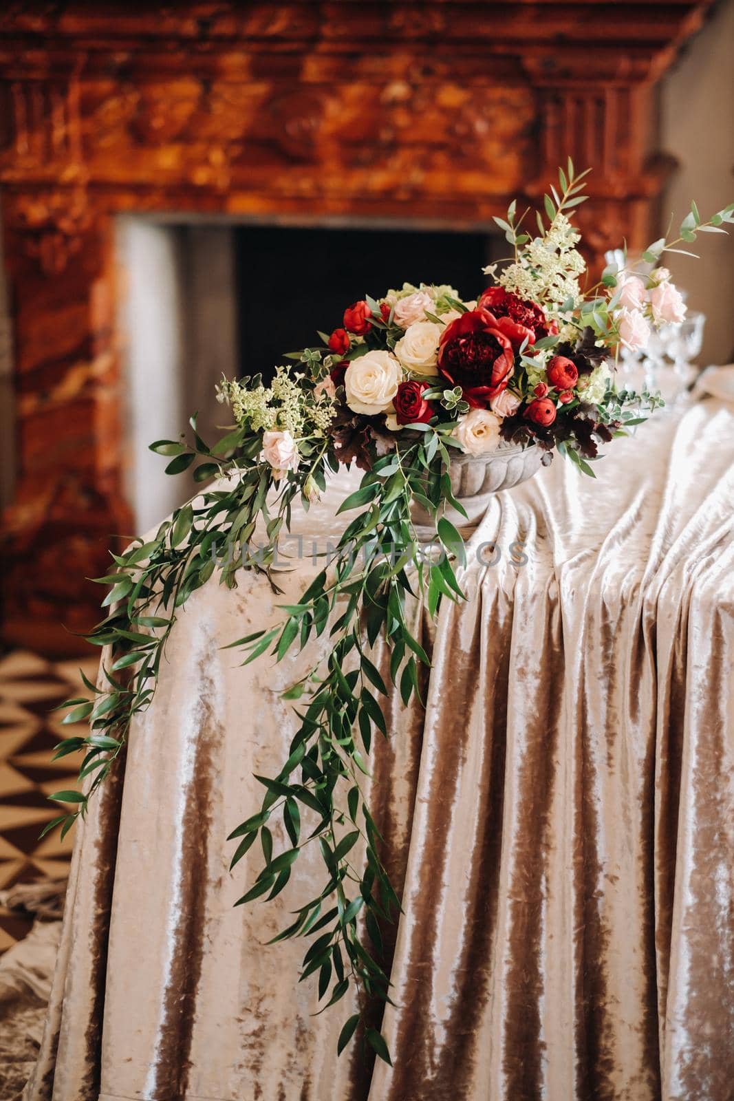 wedding table decoration with flowers on the table in the castle, table decor for dinner by candlelight.Dinner with candles.