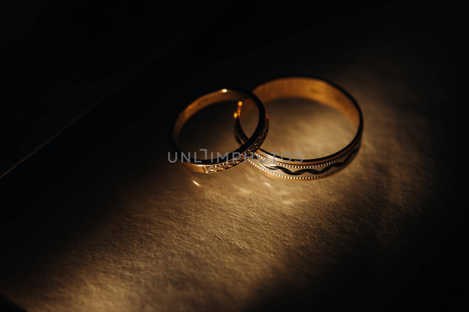 Close-up of two gold wedding rings for a wedding.