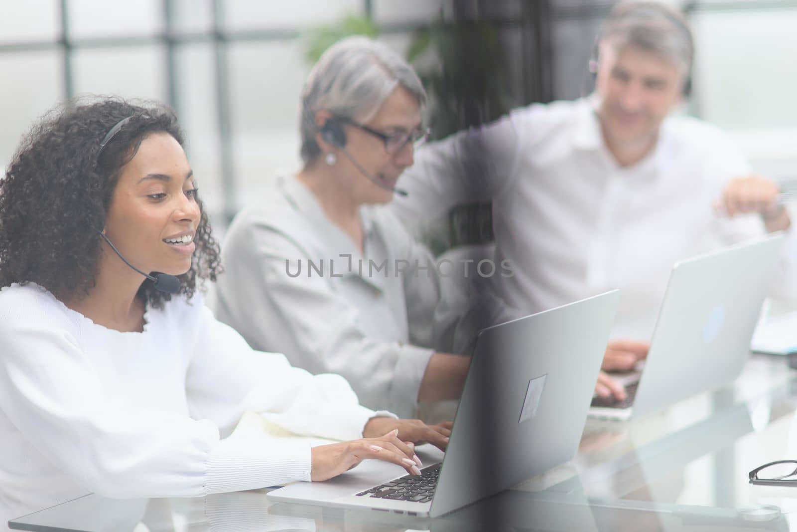 Business group working in customer and help desk office.