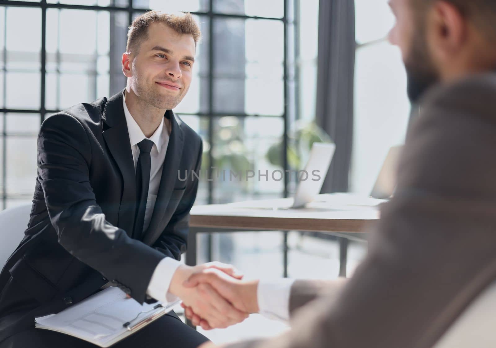 Business handshake and business people