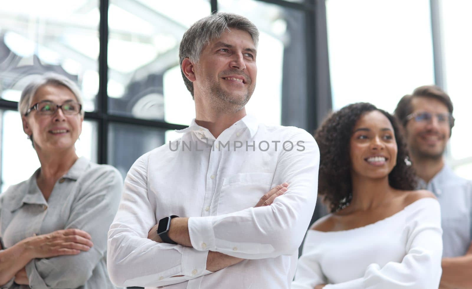 Conversation between managers and employees in the office.