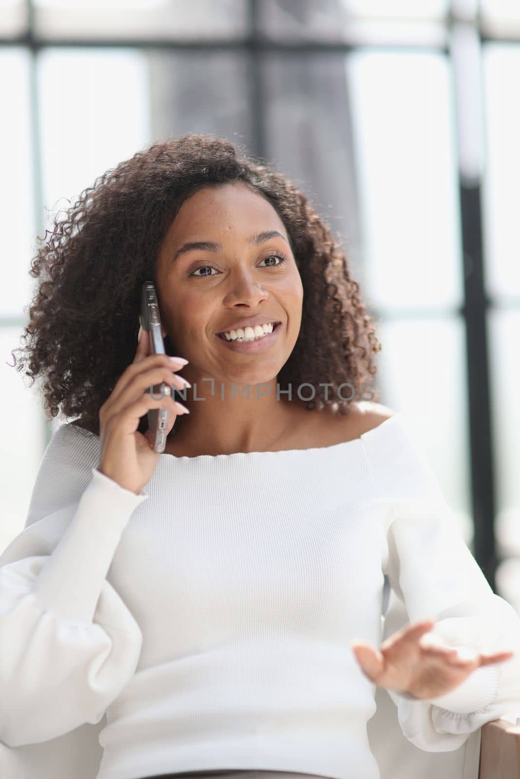 Portrait of a young African American woman using a smartphone
