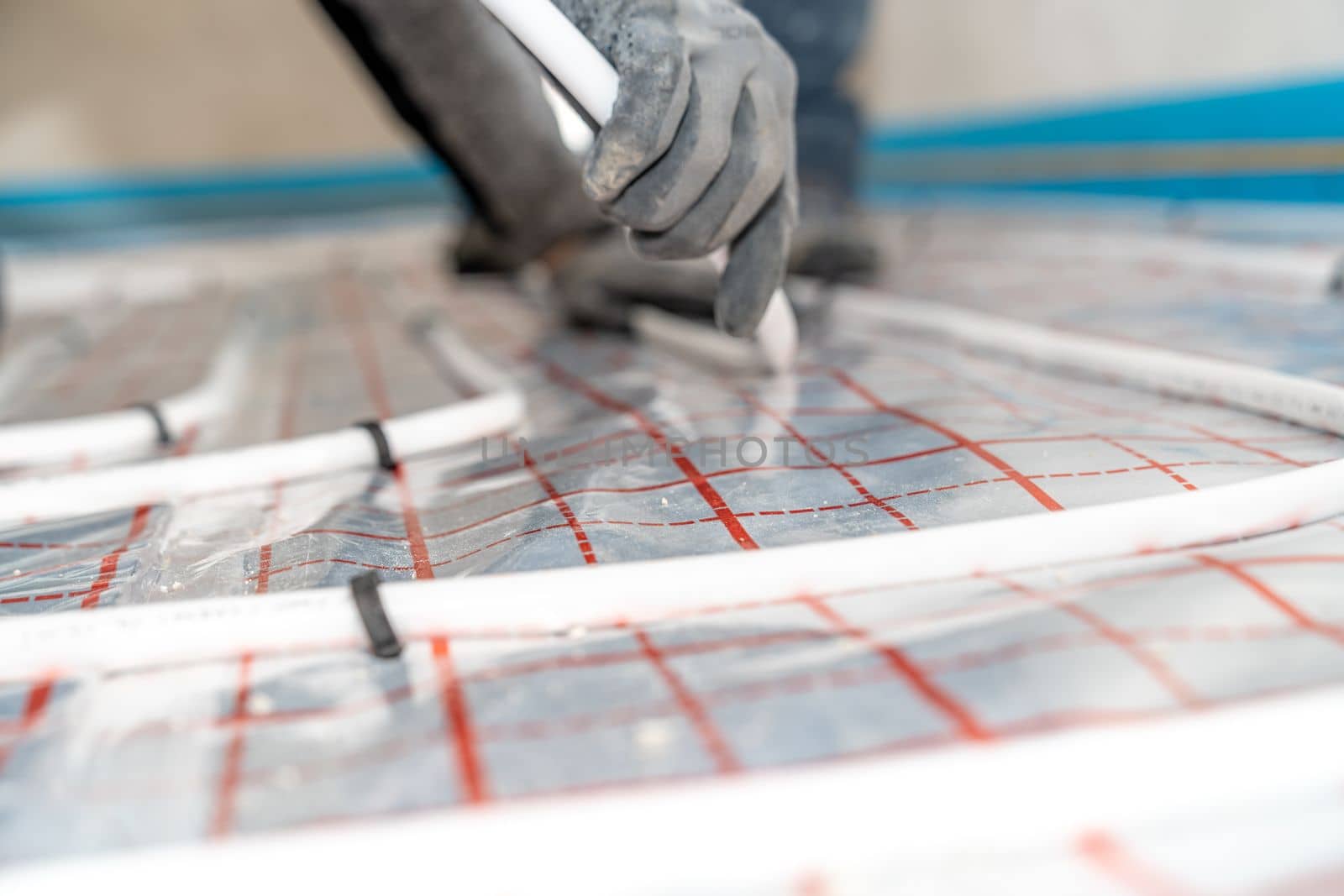 underfloor heating in the room on the construction site.