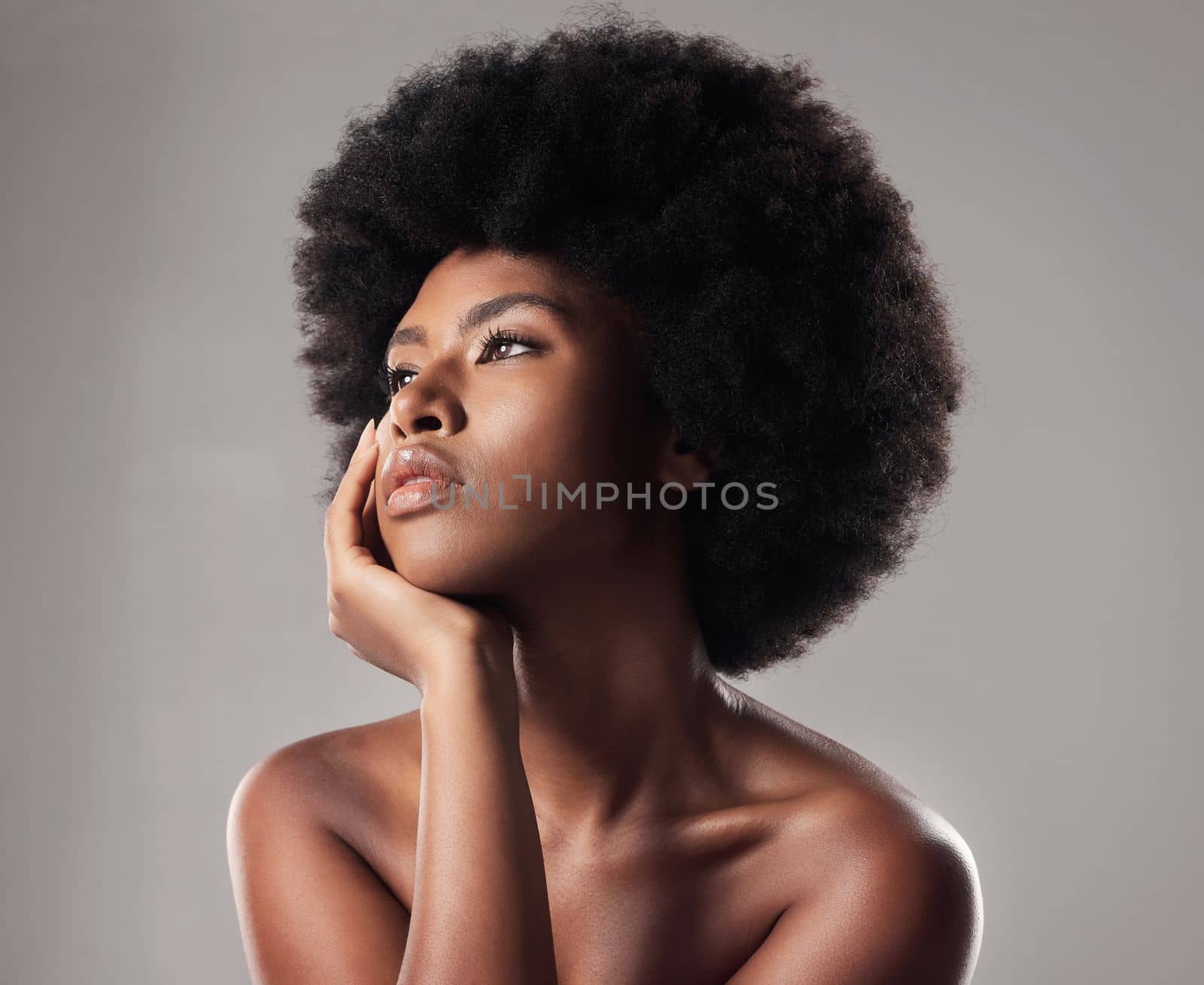 Embrace your skin at every stage. Studio shot of a young female posing against a grey background