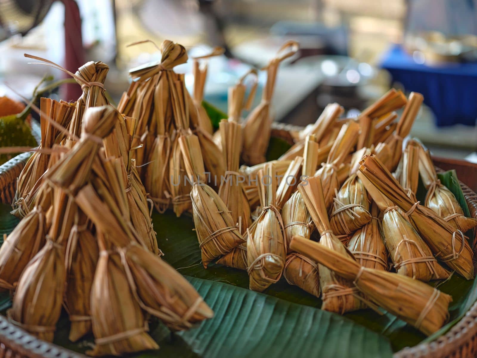 Traditional Thai food style, Glutinous rice steamed with banana wrap banana leaf or nipa palm leaf ( Khao Tom Mat ) Thai dessert.