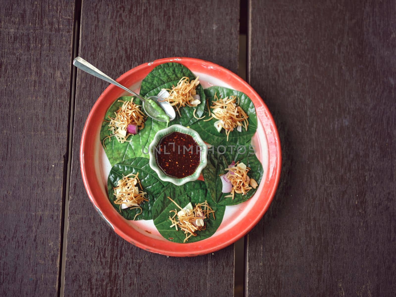 Thai traditional Appetizer , Thai Savoury leaf wraps  or Miang Kham