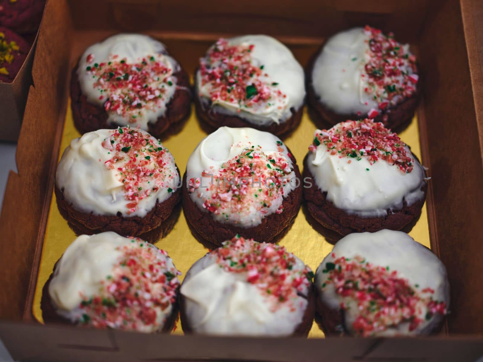 Close up of homemade cookies in a box .  by Hepjam