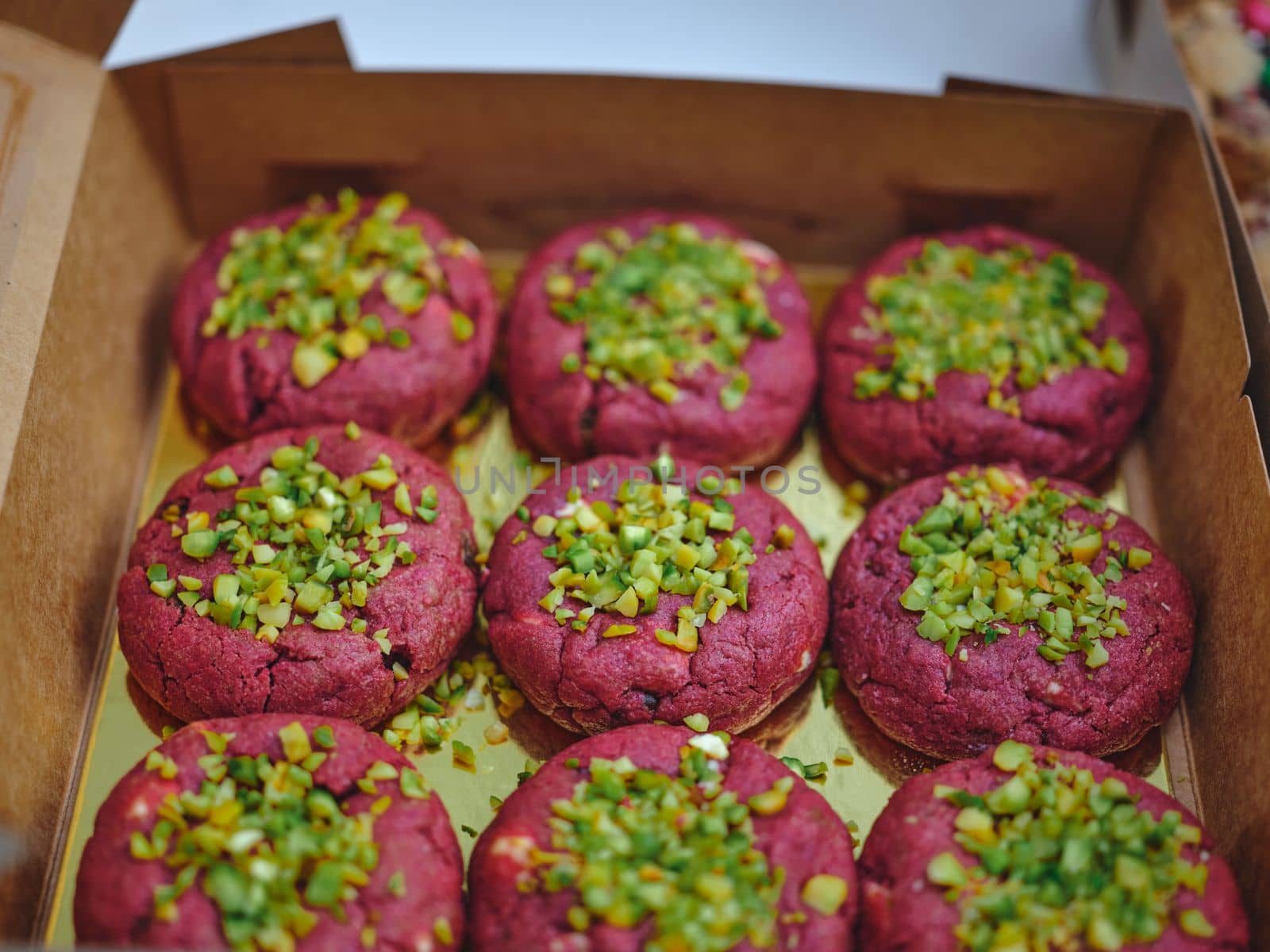 Close up of homemade cookies in a box .  by Hepjam