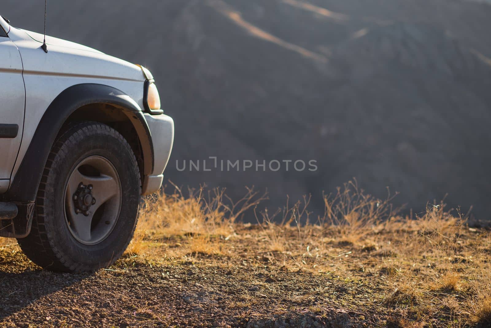 Travel car concept with 4x4 SUV car in nature, copy space.