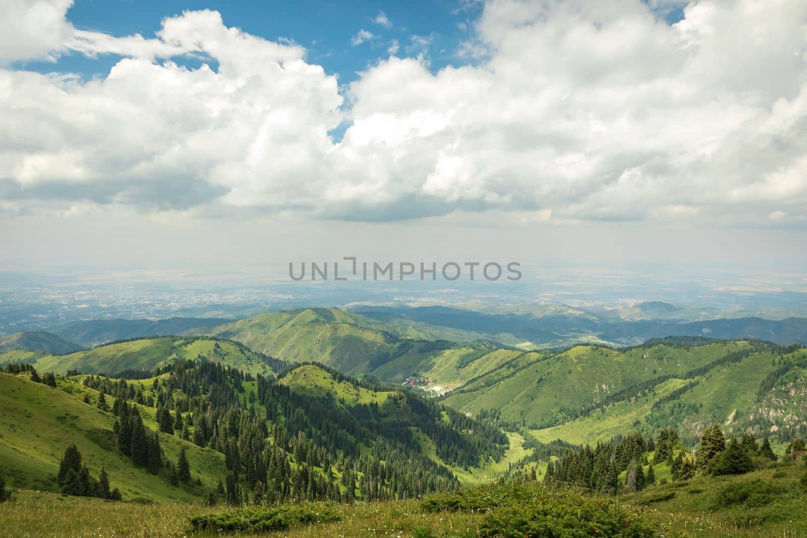 Summer landscape in the Almaty mountains in cloudy weather.