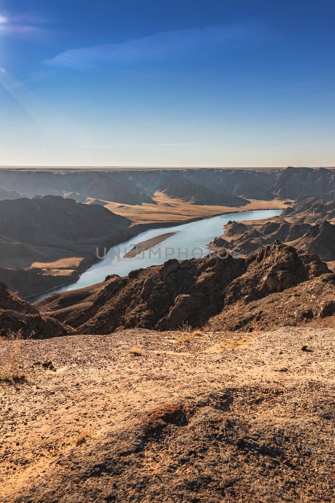 Ili river view in rocky gorge, Almaty region, Kazakhstan nature landscape, vertical and copy space