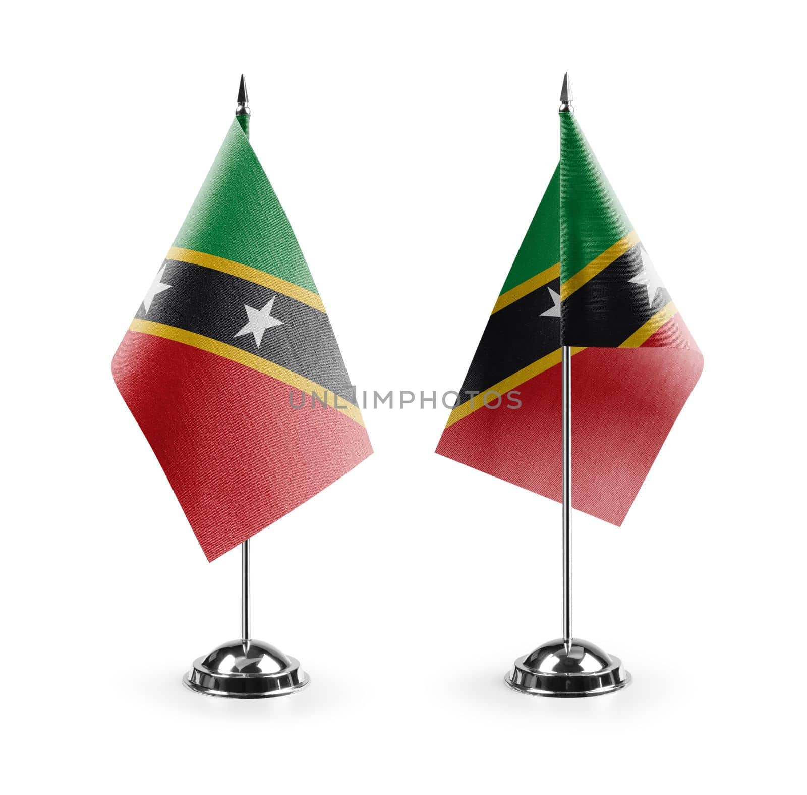 Small national flags of the Saint Kitts and Nevis on a white background by butenkow