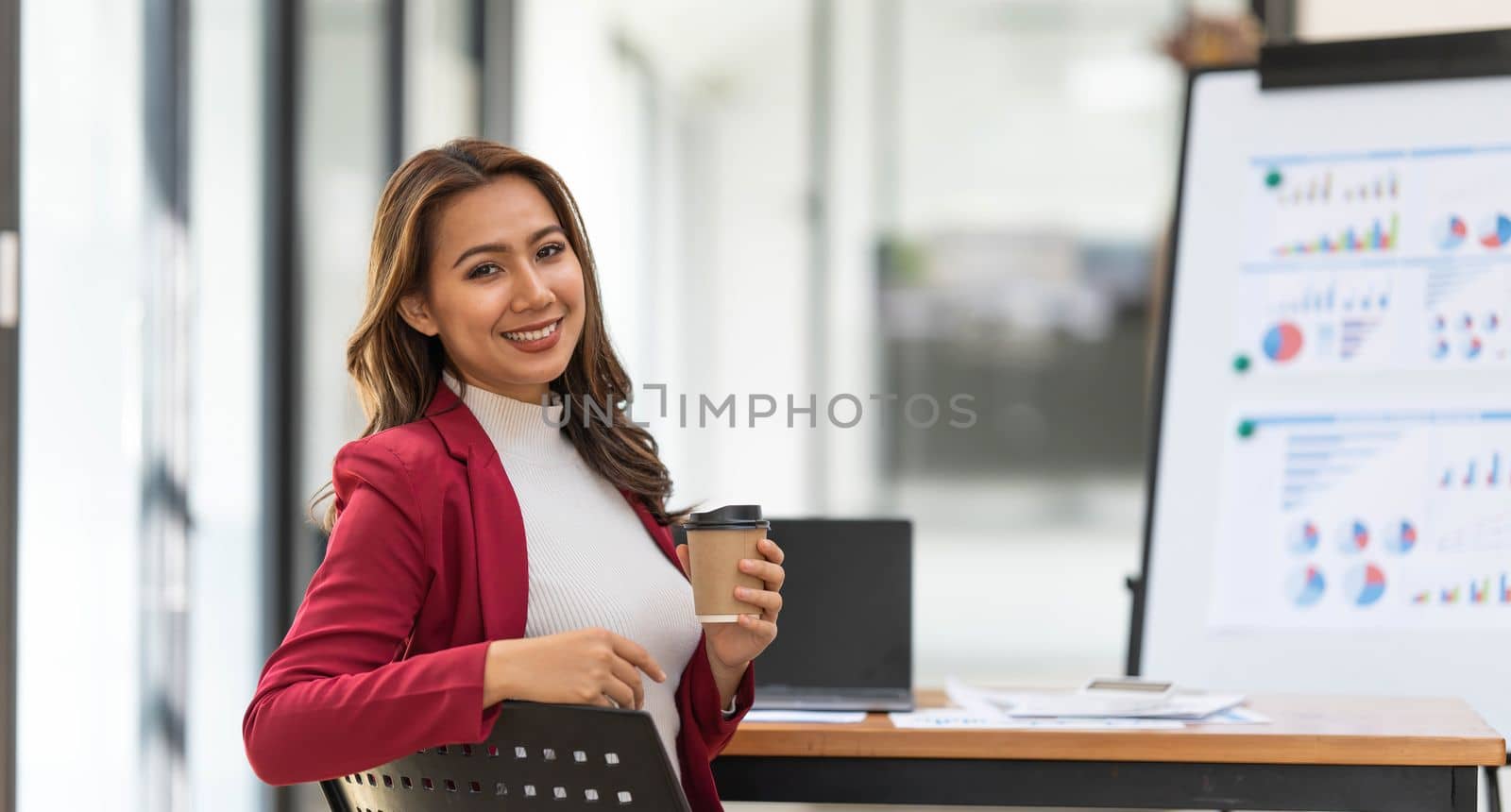 Asian Business woman working at home office and analyze financial report document. Accounting and Finance concept..