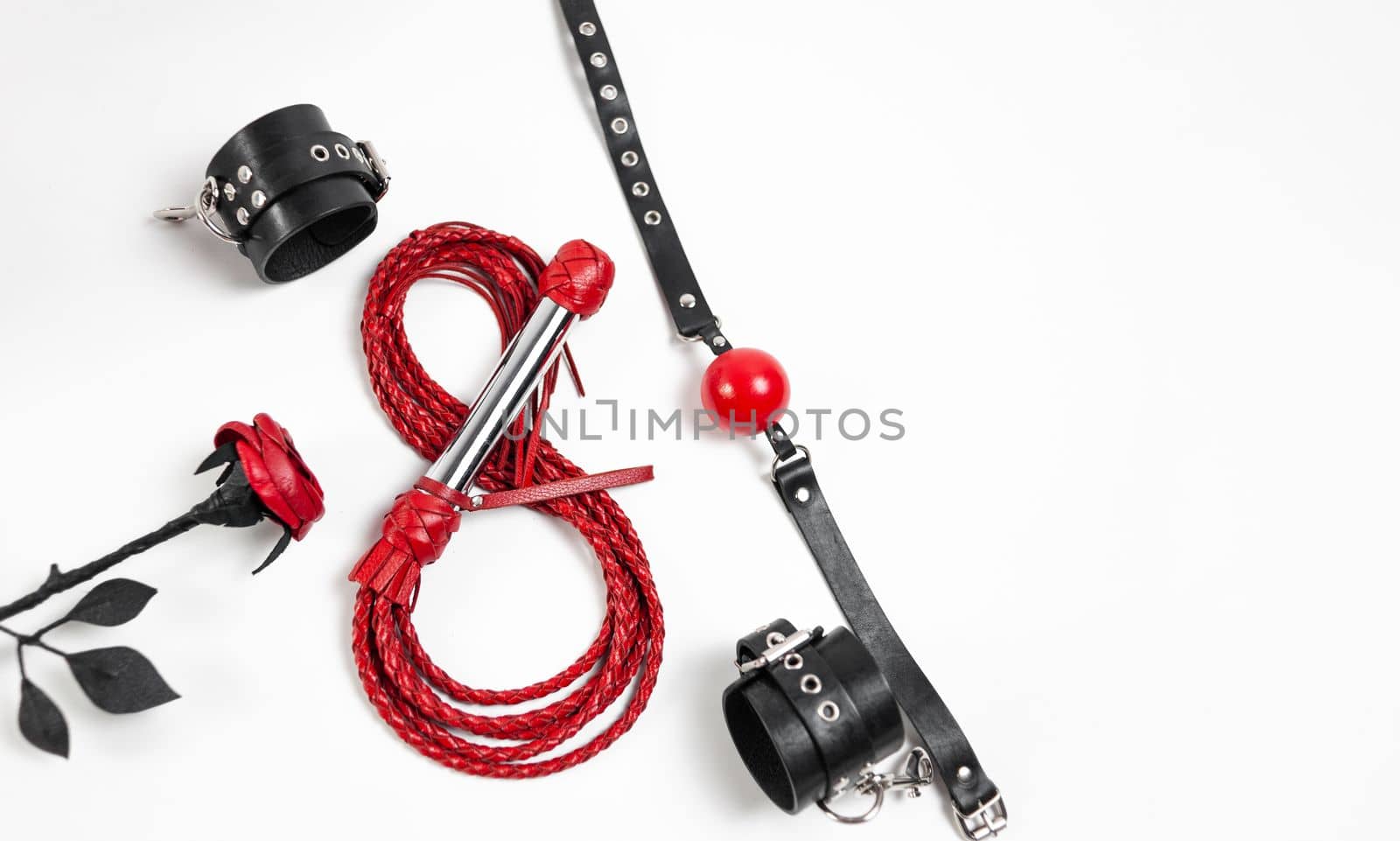For the March 8 women's day holiday sexy bdsm sex play accessories set from a sex shop on a white background copy-paste by Rotozey