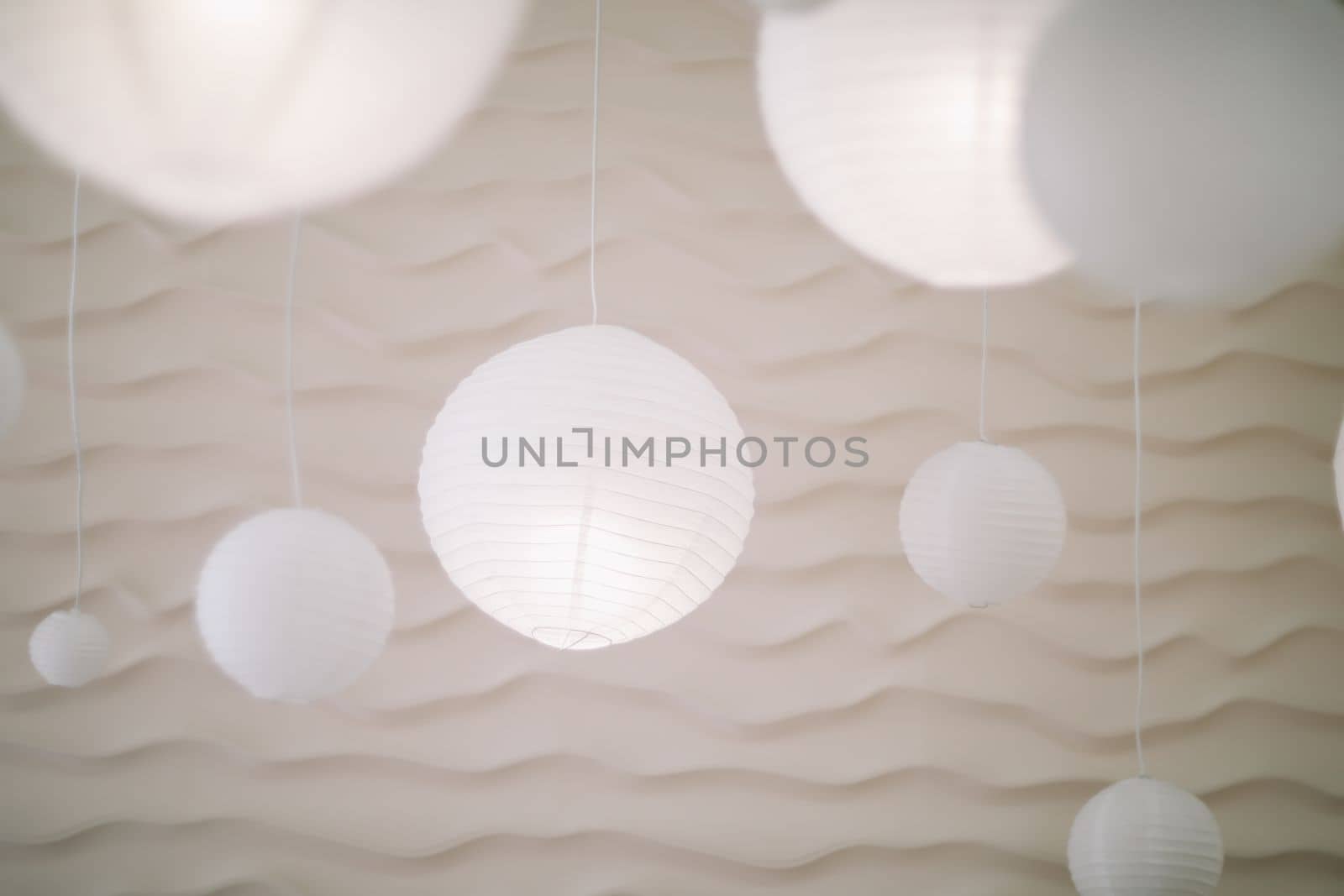 Beige paper lamps in modern interior. cozy home interior.