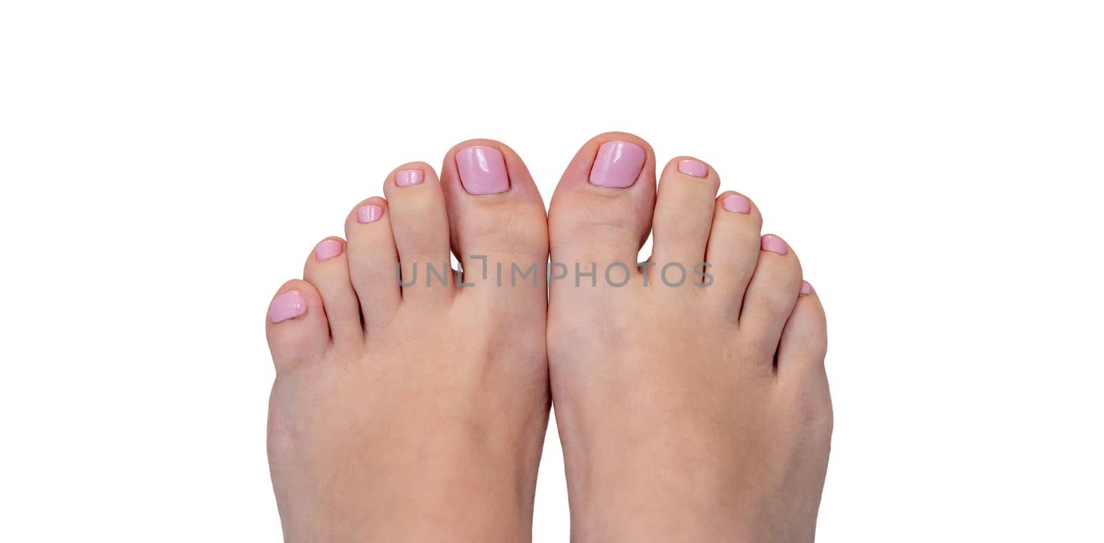 Closeup of female feet and toes on white background. Healthy feet concept by Mariakray