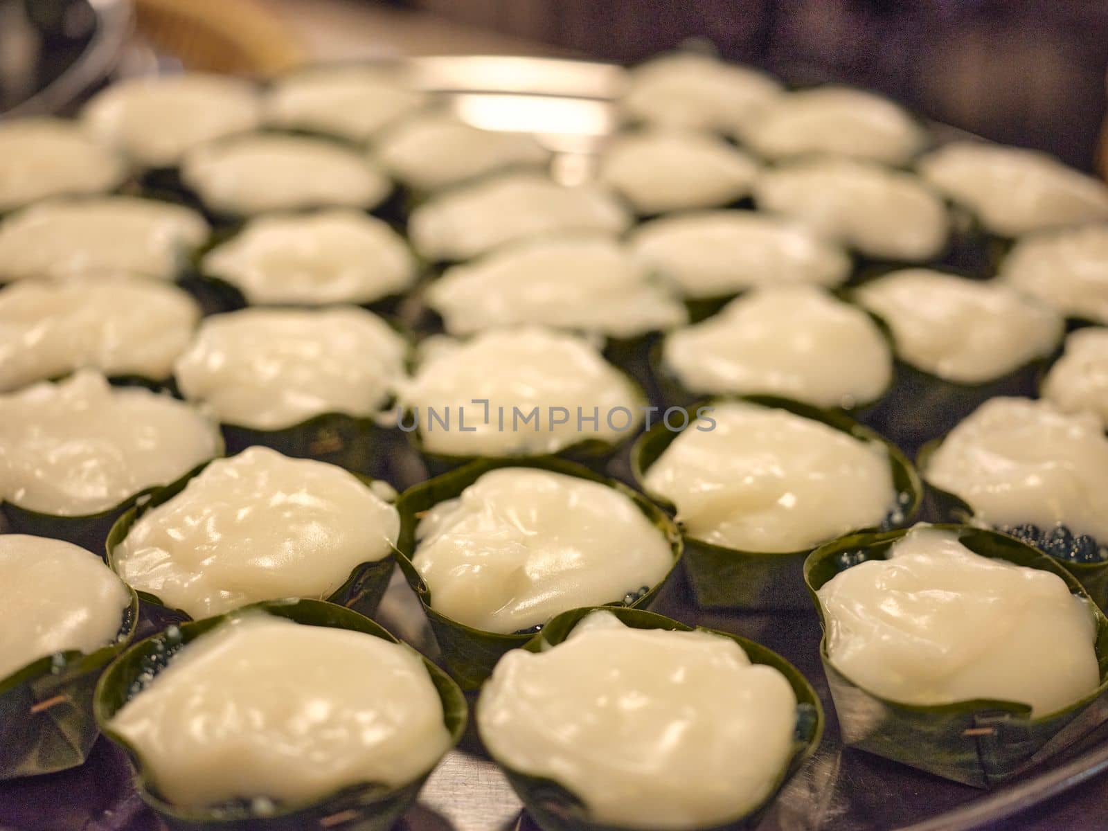 Thai Pudding with Coconut topping on banana leaf(Tako) by Hepjam