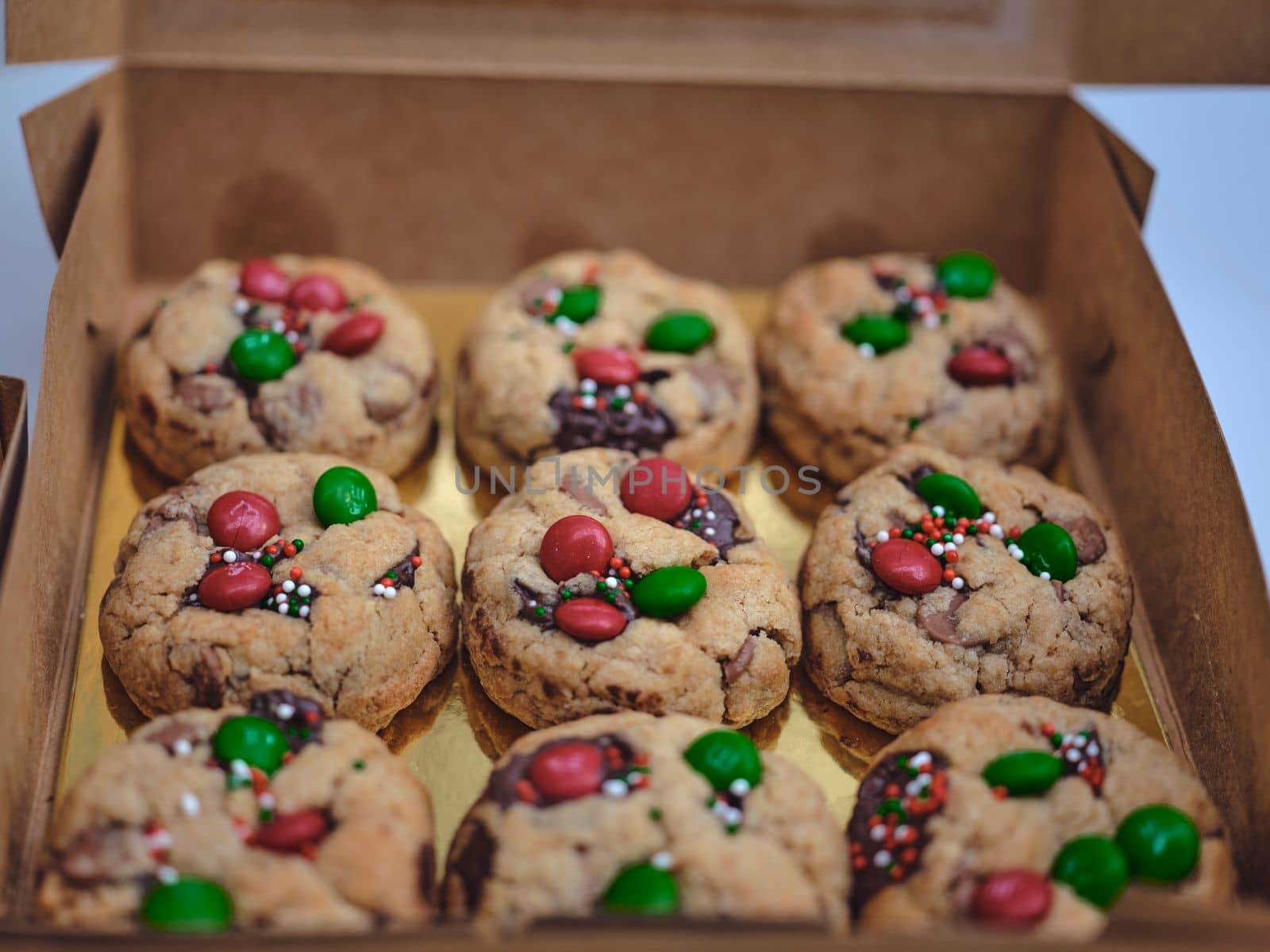 Close up of homemade cookies in a box .  by Hepjam