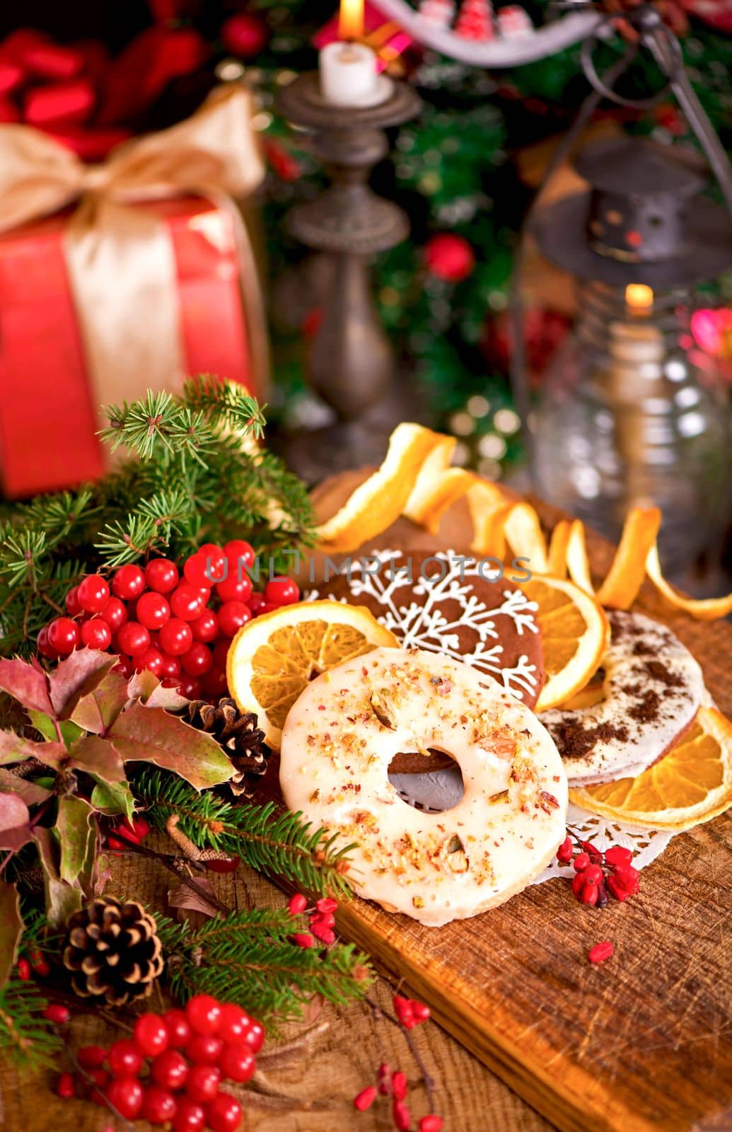 Christmas decoration with cookies and spices on an old wooden background.