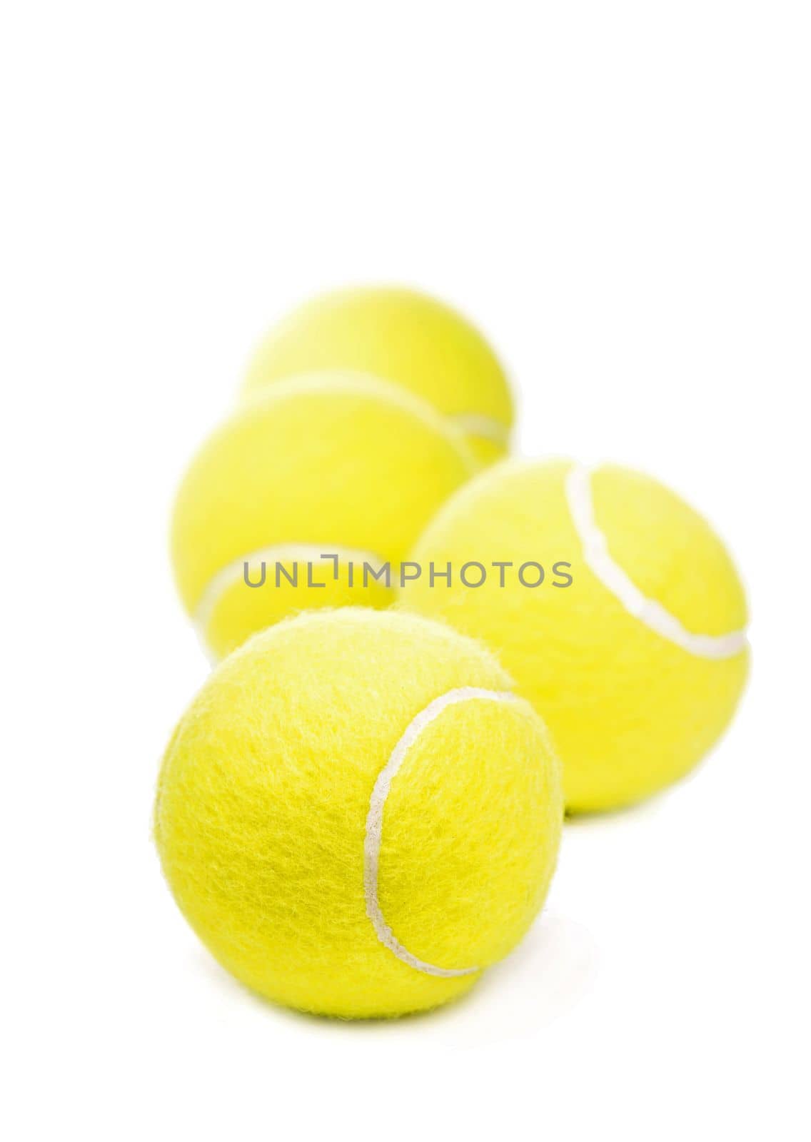 tennis ball. yellow tennis balls isolated on a white background by aprilphoto