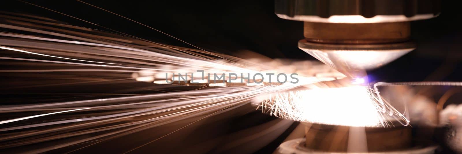 Laser cutting of metal sheet closeup. CNC Laser cutting of metal using modern industrial technologies
