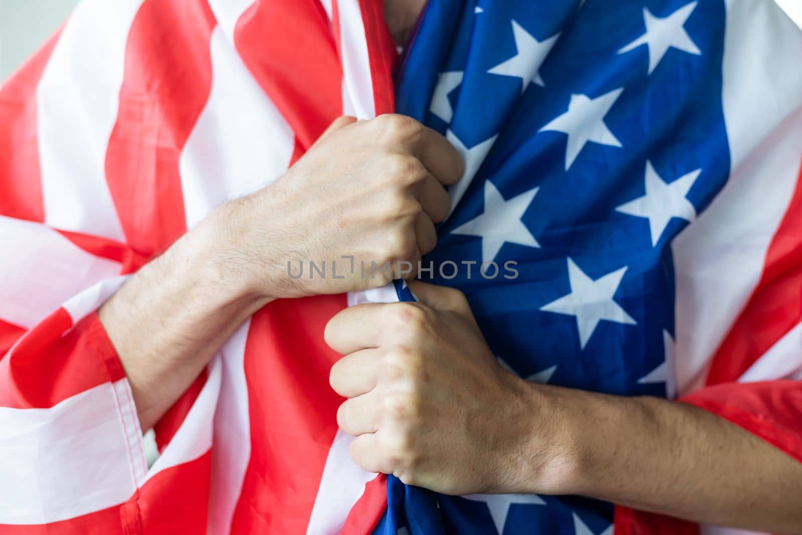 male hands on usa flag by Andelov13