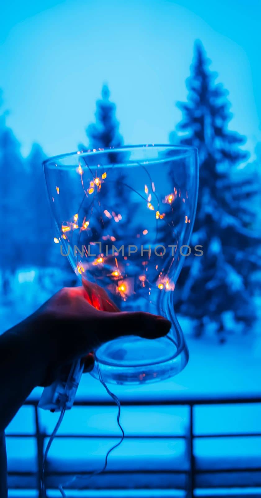 Christmas garland lights. Winter home decor. Blurred bokeh festive background.
