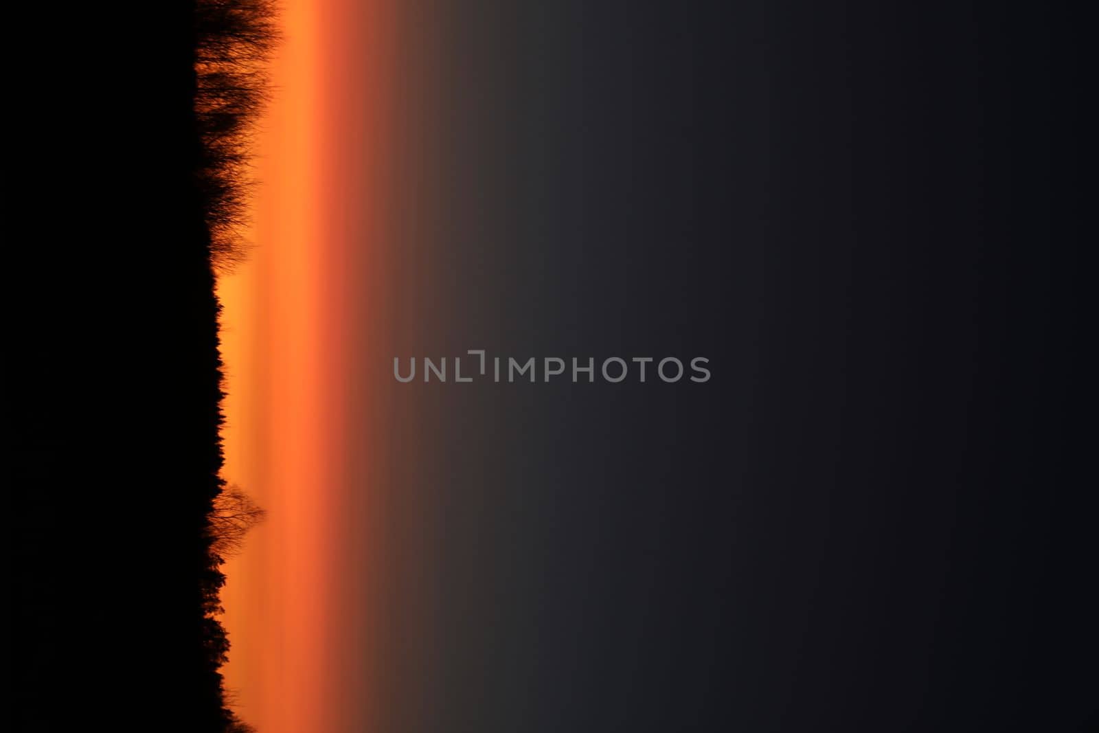 Real amazing panoramic sunrise or sunset sky with colorful clouds. Gradient color. Sky texture, abstract nature background.