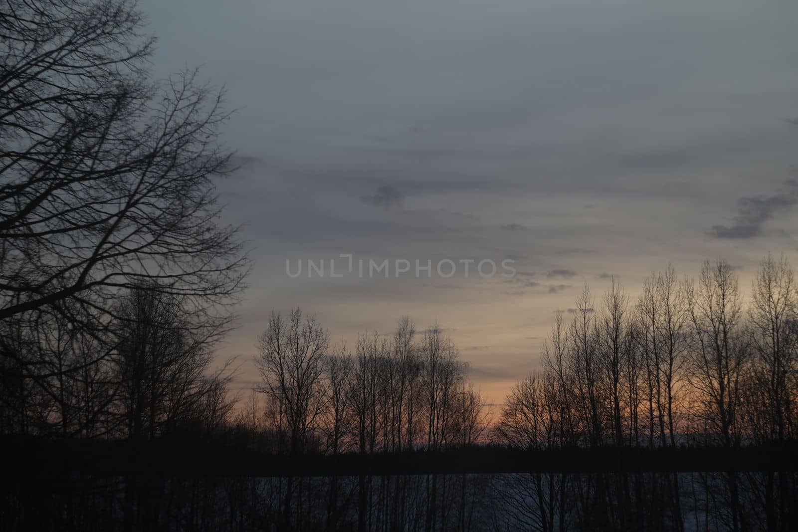 Real amazing panoramic sunrise or sunset sky with colorful clouds. Gradient color. Sky texture, abstract nature background.