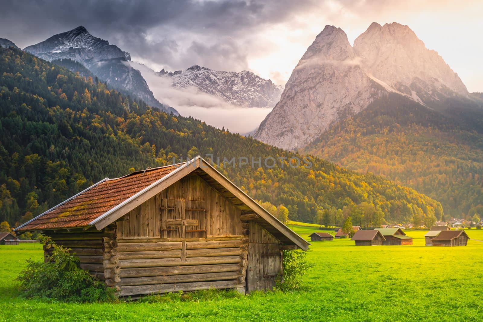 Bavarian alps and rustic farm barn, Garmisch, Zugspitze massif, Bavaria, Germany by positivetravelart