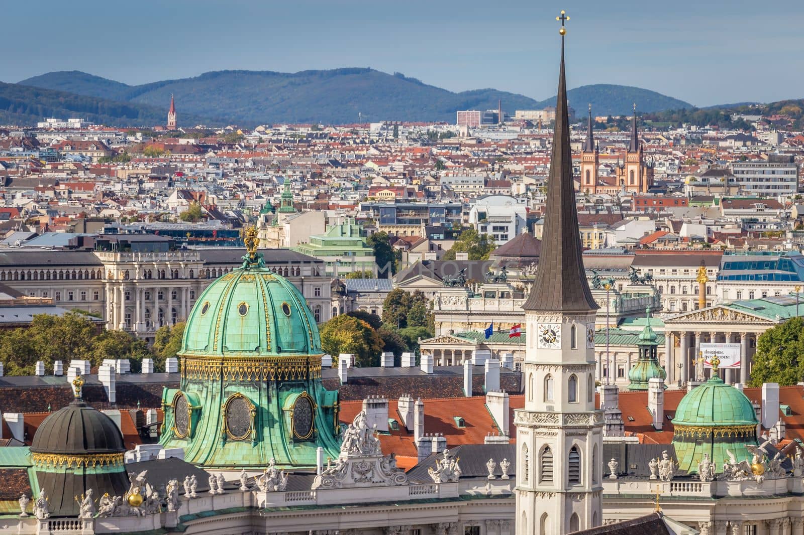 Panoramic view of Vienna cityscape with Cathedral and roofs from above, Austria by positivetravelart